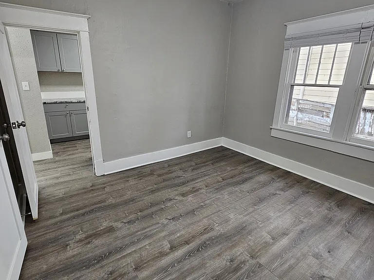 Rear Bedroom 11' x 11' with ceiling fan