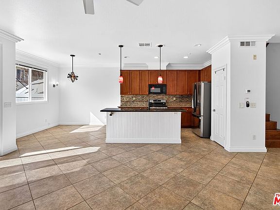 5th image of 7161 East Ave APT 59