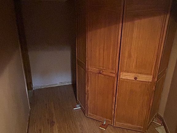 Privacy panel concealing entry and bathroom