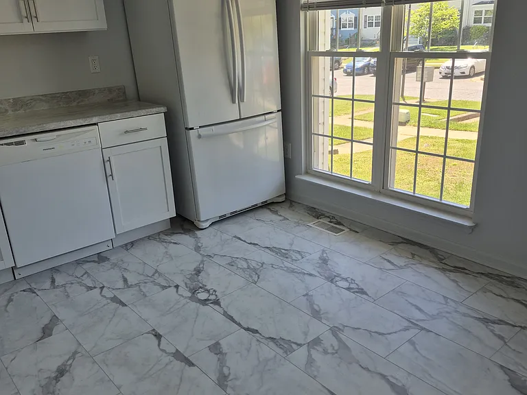 Large new K windows give lots of light. Eat-in kitchen.