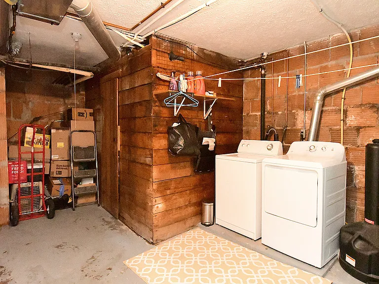 Basement storage area and full size washer and dryer