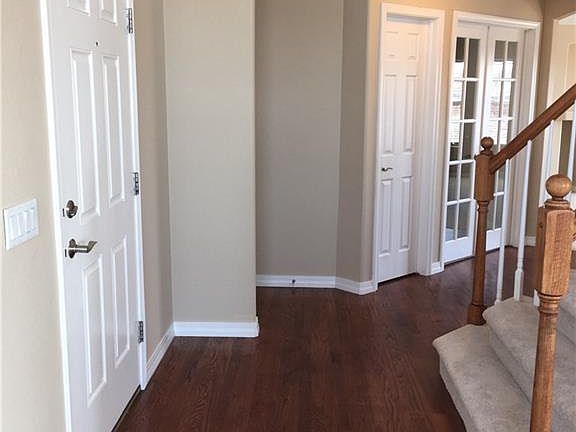 entry. the glass doors open into the study