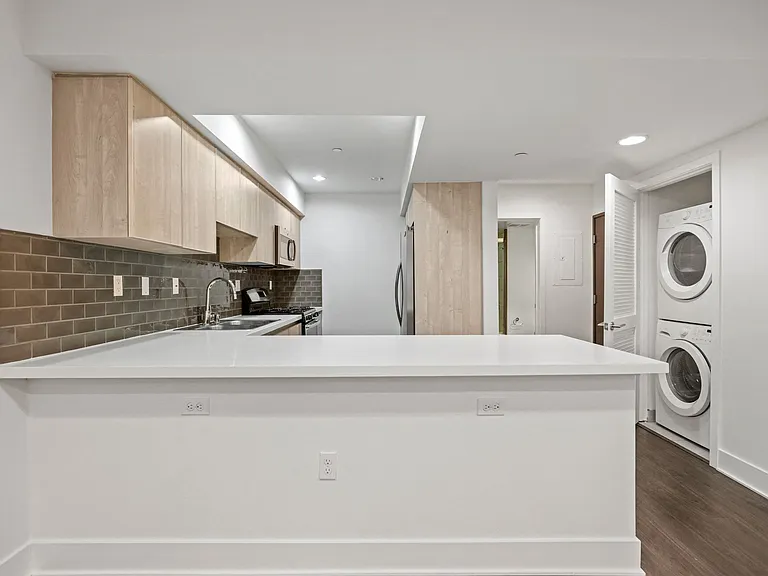 Kitchen with In-Suite Washer & Dryer