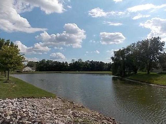 Pond. View of pond from exterior of condo.
