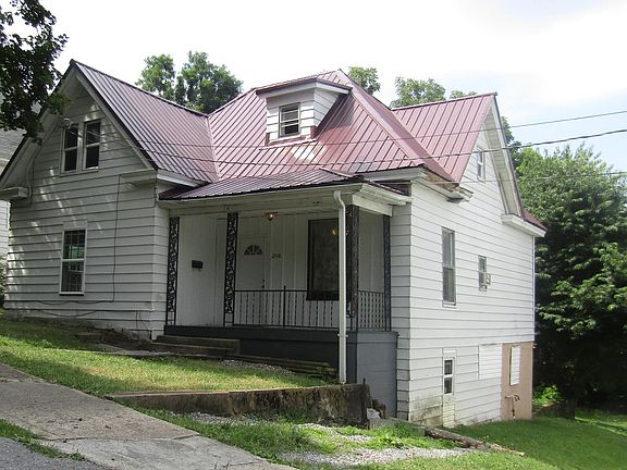 Gravel parking area for one vehicle