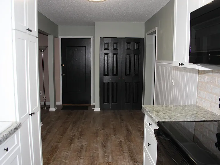 From kitchen looking toward entry way.