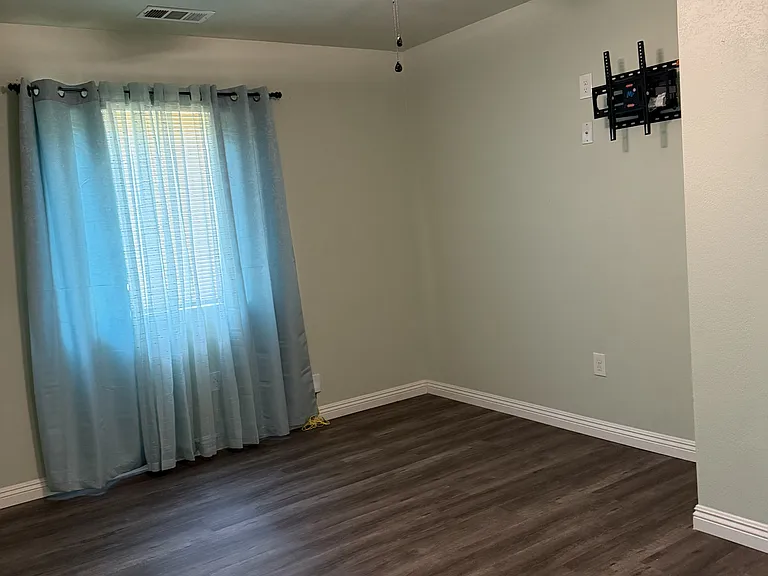 Bedroom #2 (mid-room view) with wall tv mount included