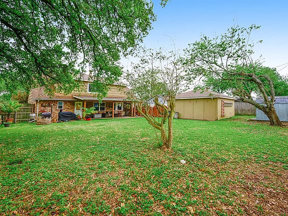 Large established yard for family fun or entertaining.