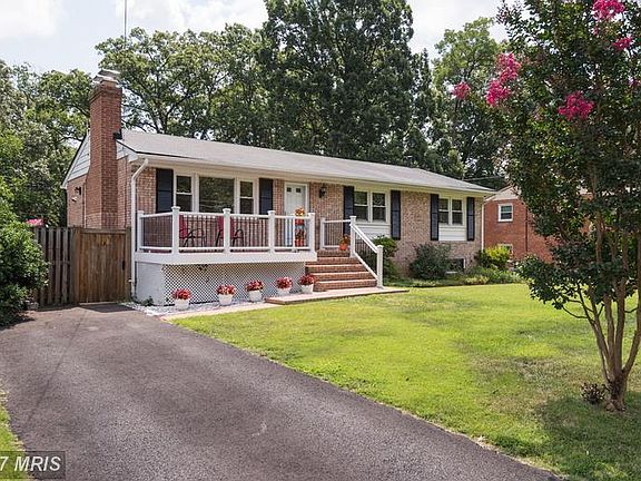 CHARMING FRONT PORCH and BEAUTIFUL LANDSCAPING!
