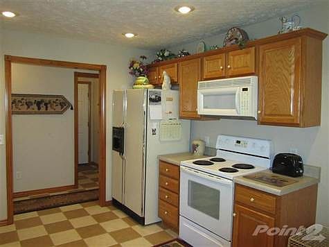 Bright and open Kitchen with tiled floors