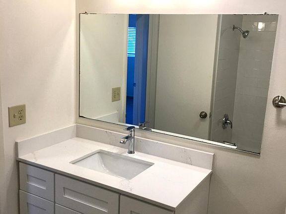 Full bath with tub upstairs, half-bath downstairs