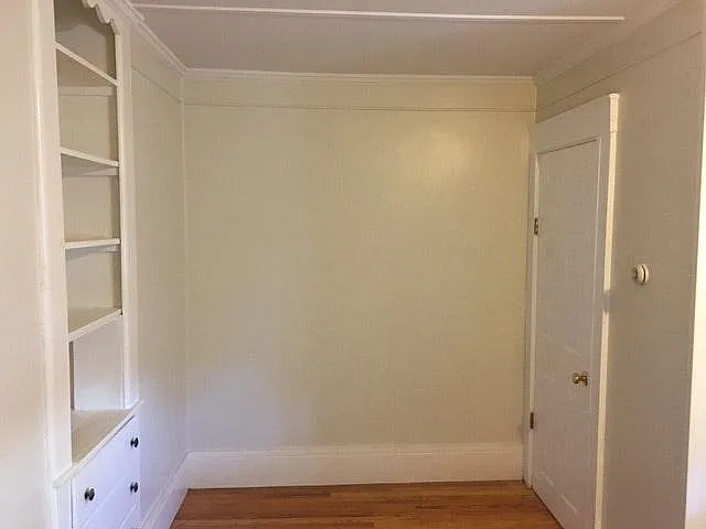 Bedroom and entrance to bathroom