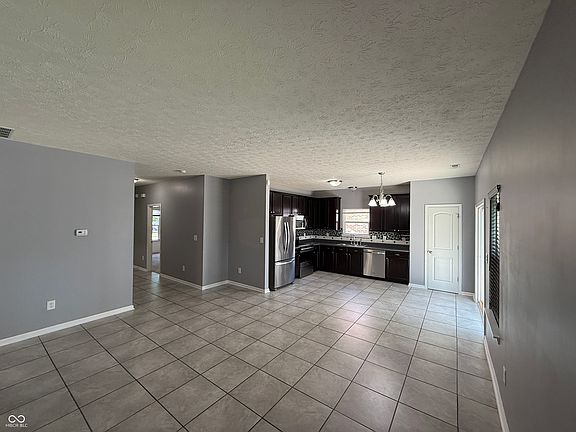 4th image of 9539 Woodsong Way