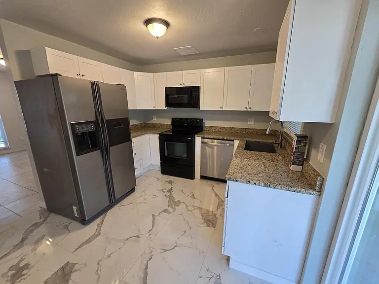 3406 Murrow St — Photo 7