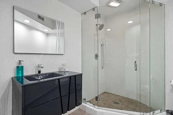 Enjoy a rejuvenating shower in our serene bathroom.
