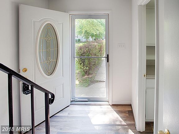 Welcoming Foyer with newer Hardwood Floors!