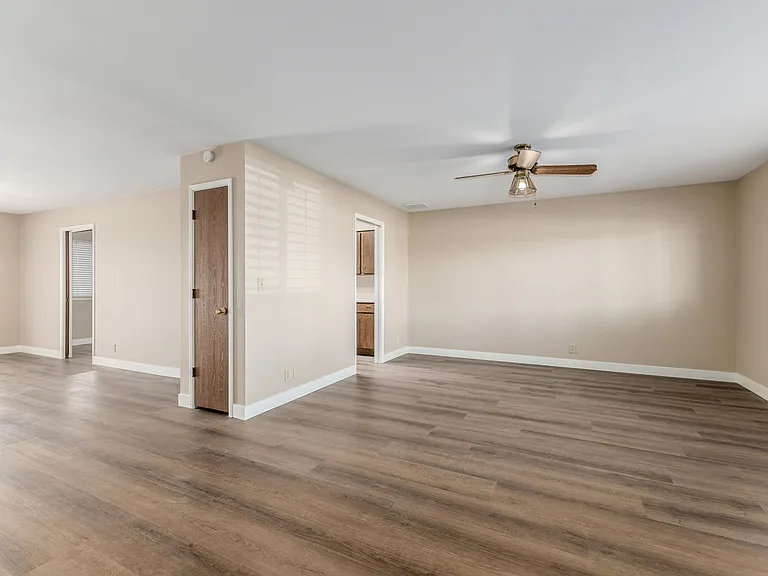 View of living room and dining room from front door
