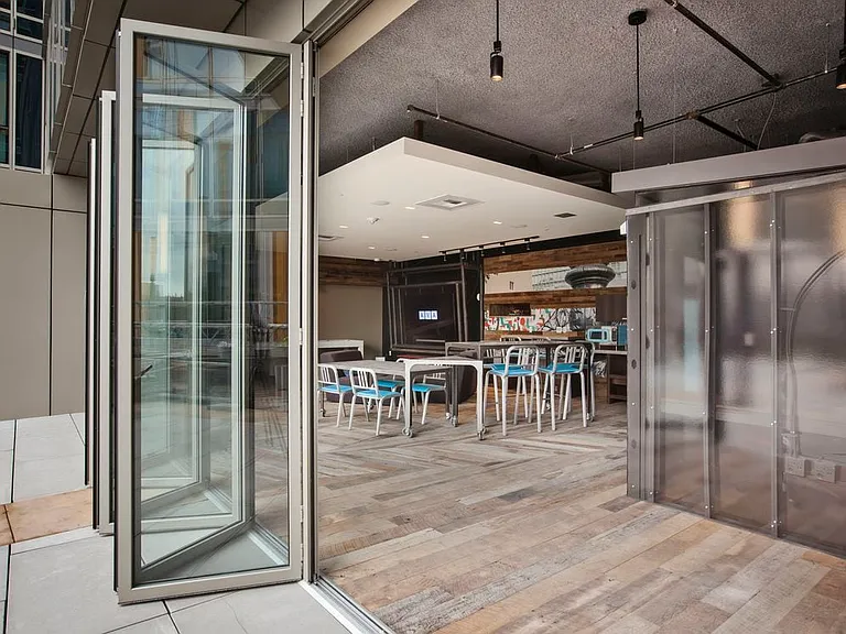 Chill lounge with workstations, common area seating and patio access