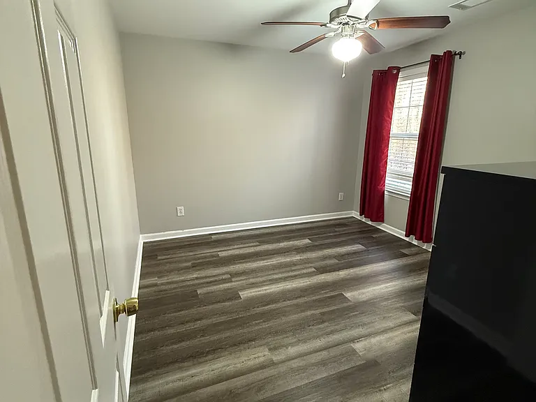 Top Floor Bedroom with Window above Deck
