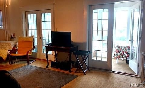 Living area into additional year round porch room