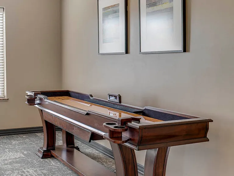 Strike up a friendly game of shuffleboard in the clubhouse.