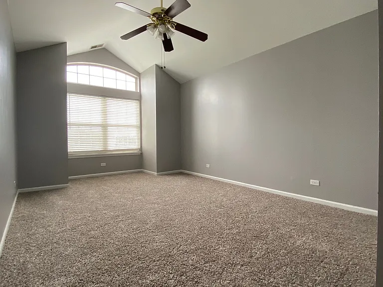 Primary Bedroom w/vaulted Ceilings