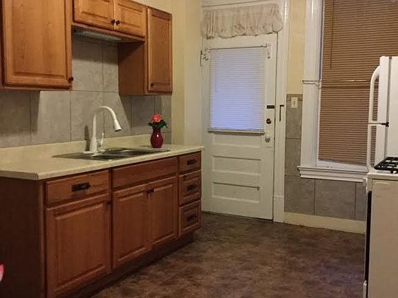 Updated Kitchen w/back door to porch & rear stair exit