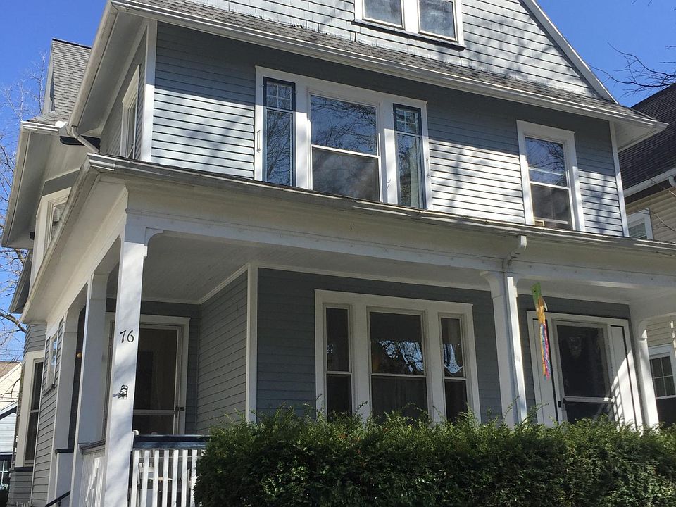 Front of duplex, apartment on left, lower level.