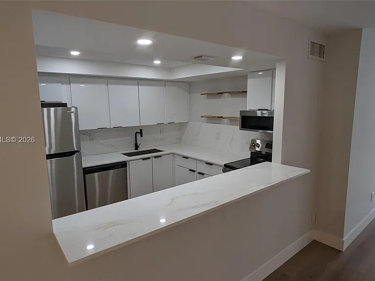 501 Three Islands Blvd #112 — Photo 6