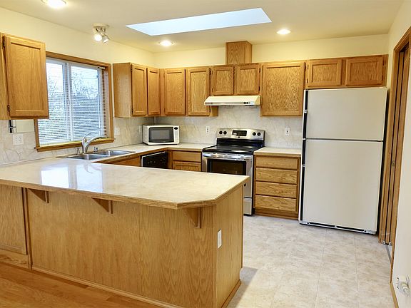 Kitchen with Breakfast Bar on Upper Level
