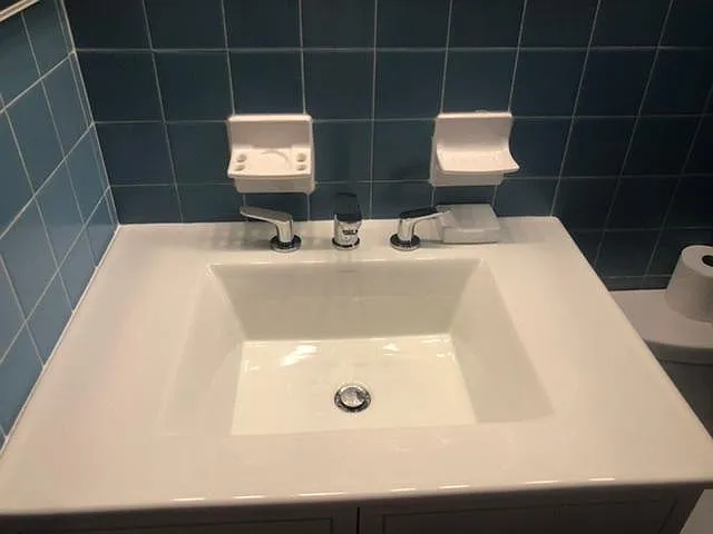 new Kohler modern sink , cabinet and hardware