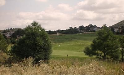 Backs to golf course