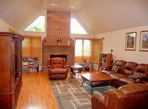 Great Room w/Vaulted Ceiling & Stone Fireplace