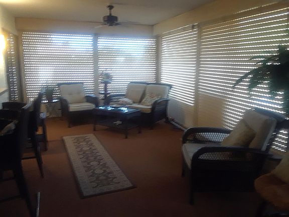 hugh lanai for relaxing and watching tv with an entertainment bar