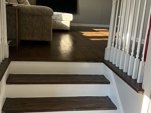 Steps to Living Room w/ Refinished Original Hardwood Floors!