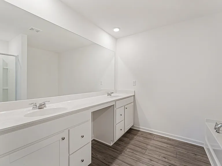 Primary bathroom with double vanities