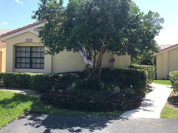 Front of Unit with Two Reserved Parking Spaces.