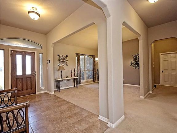 The optional formal living or dining area is just off the foyer.