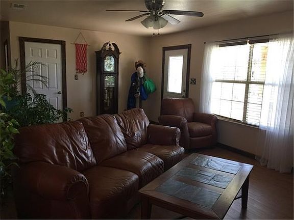 living room with large windows to the front