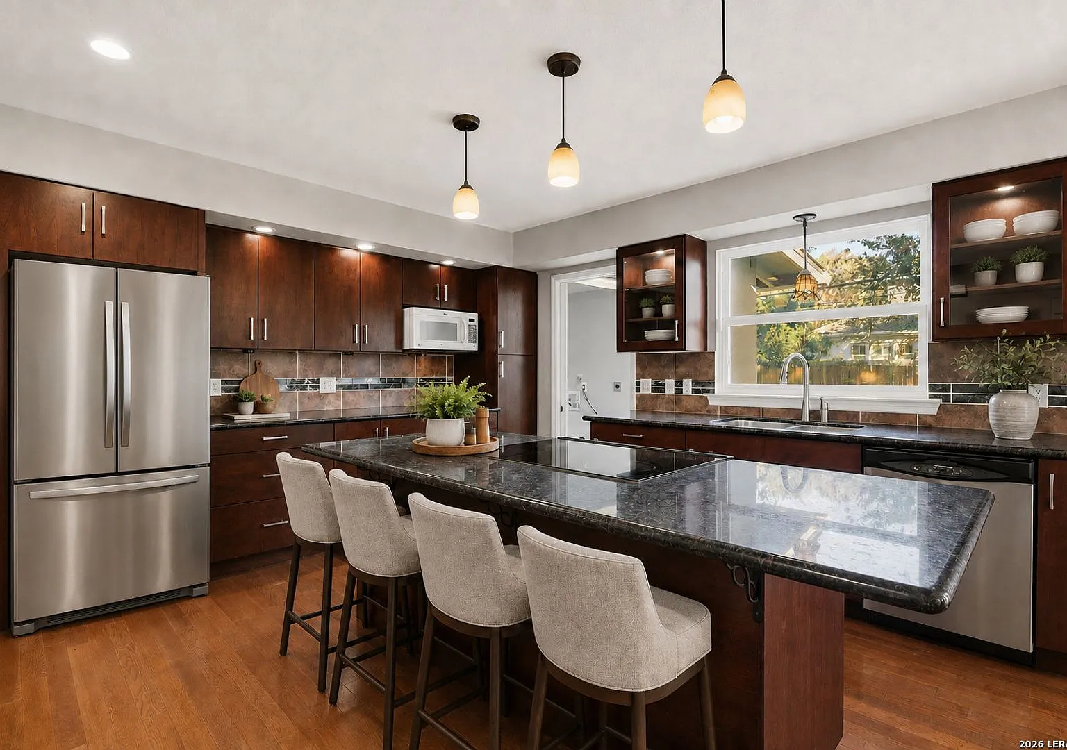 Charming 4-Bedroom Home with Spacious Living Areas in Convenient Location — Photo 4