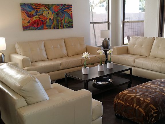 Leather couches/chairs seat seven with additional seating on