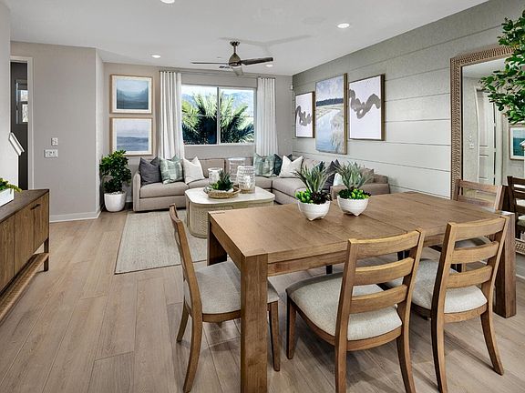 An image of the Dining and Kitchen in the Plan 4 model home at Magnolia in Arcadia.