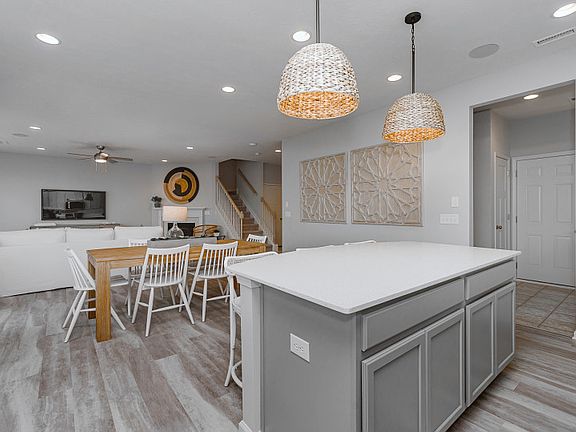 Kitchen open to casual dining and gathering room