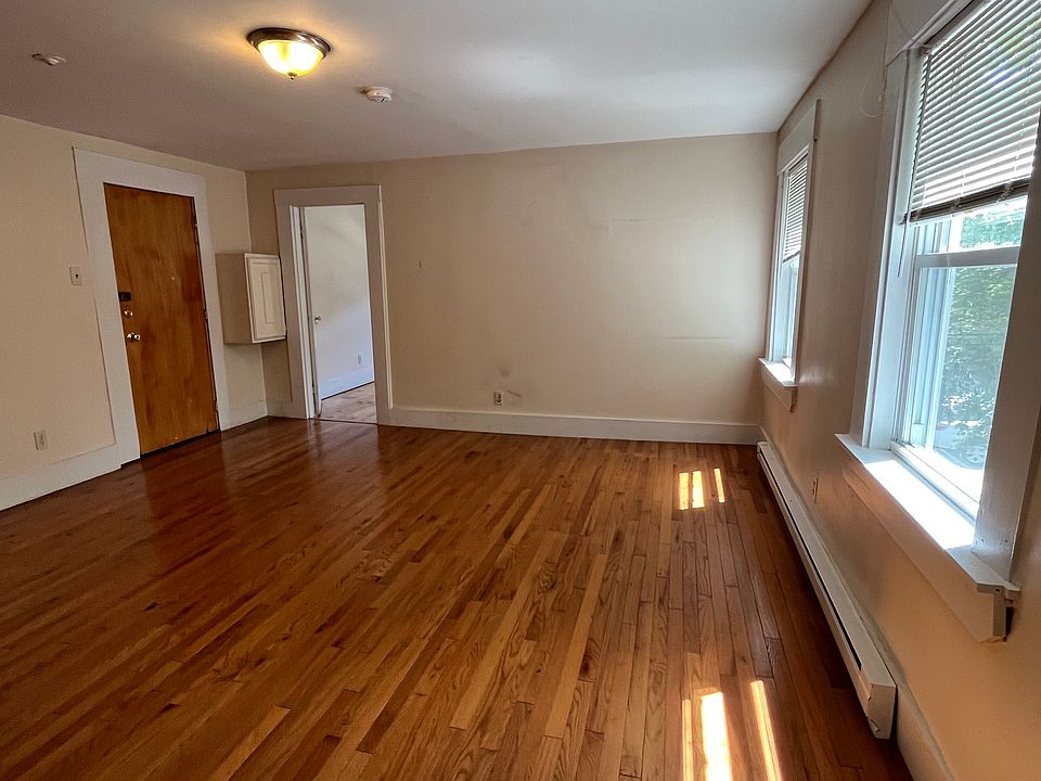 living room, view of entrance door and master bedroom door