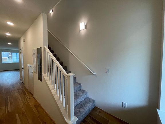 Front door entry and stairs to bedrooms