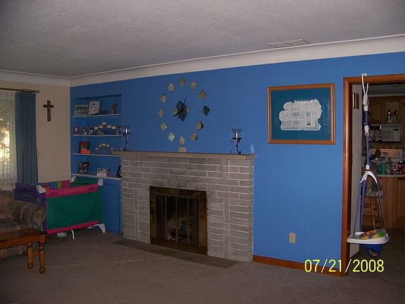Living room w/ gas & wood FP
