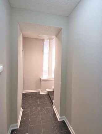 Marble entry/foyer with closet