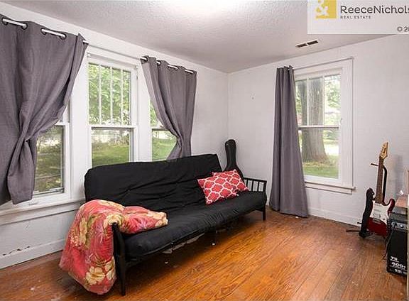 Second bedroom or sitting room with hardwood floors