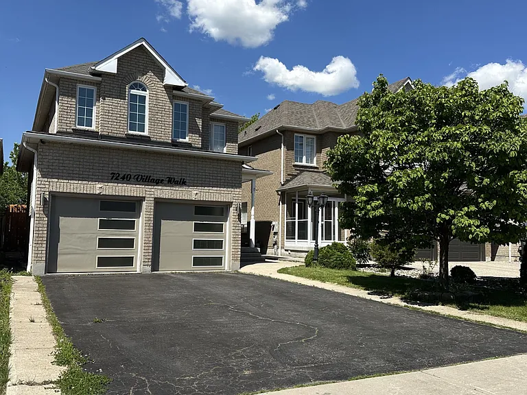 7240 Village Walk — Photo 1