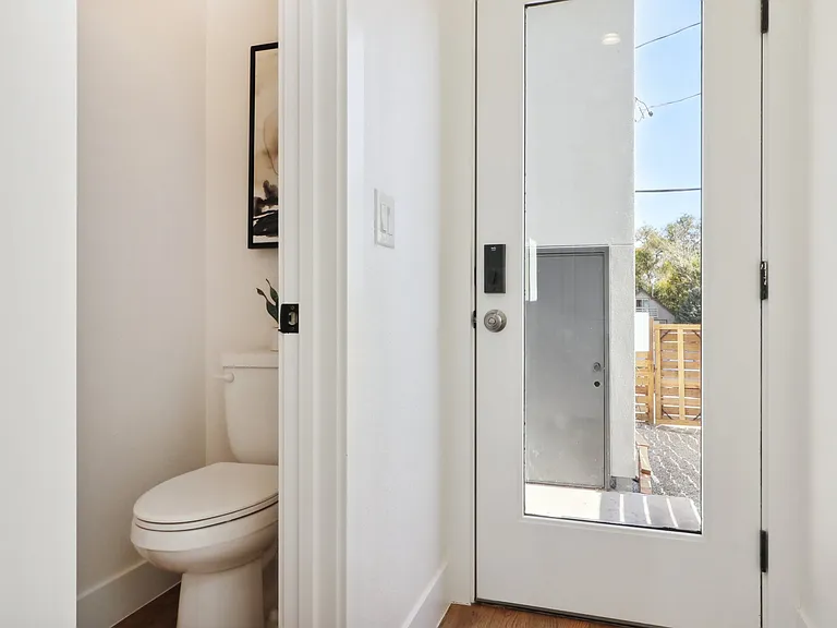Powder room on main level near back door